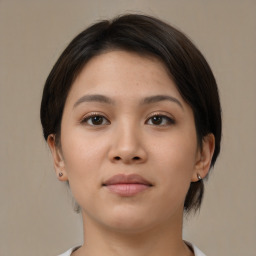 Neutral asian young-adult female with medium  brown hair and brown eyes