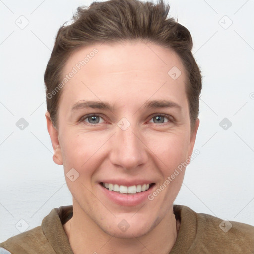 Joyful white young-adult female with short  brown hair and grey eyes