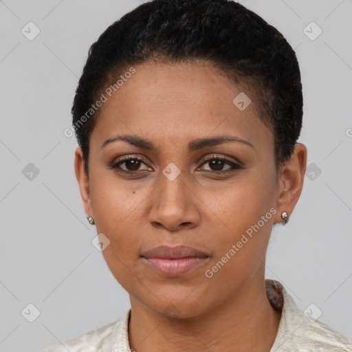 Joyful black young-adult female with short  black hair and brown eyes