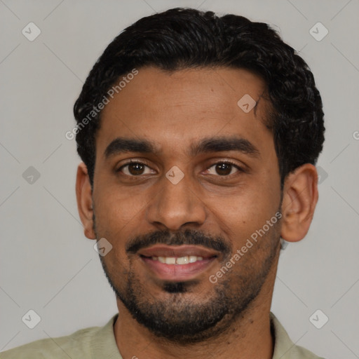 Joyful latino young-adult male with short  black hair and brown eyes