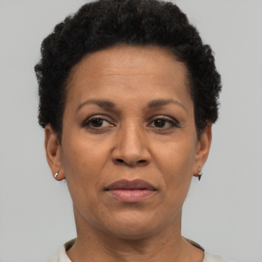 Neutral black adult female with short  black hair and brown eyes