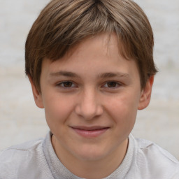 Joyful white child female with short  brown hair and brown eyes