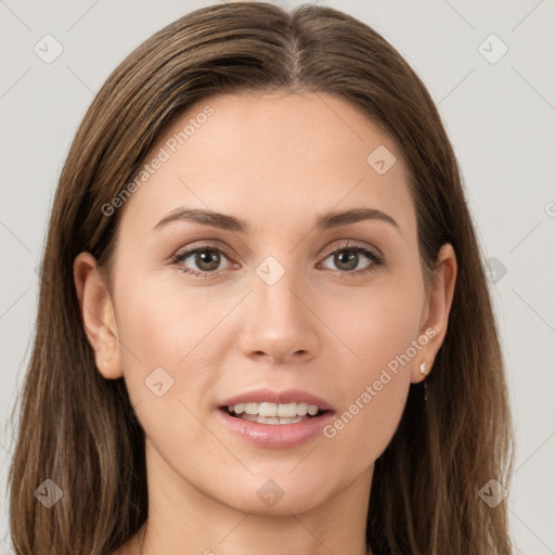 Joyful white young-adult female with long  brown hair and grey eyes