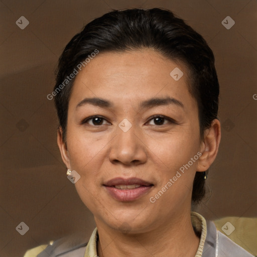 Joyful white adult female with short  brown hair and brown eyes