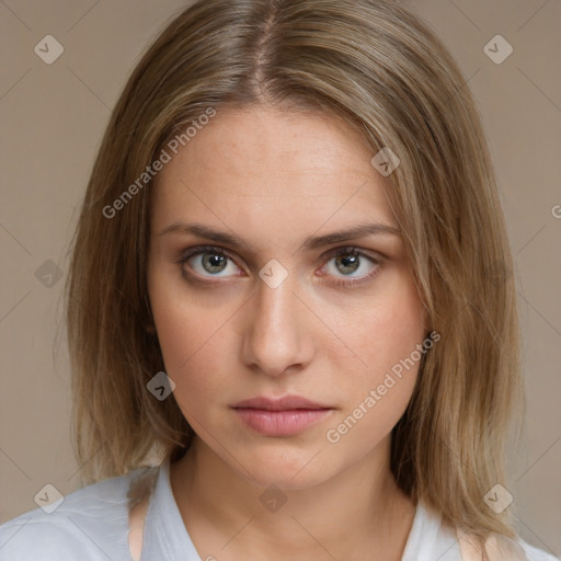 Neutral white young-adult female with medium  brown hair and brown eyes