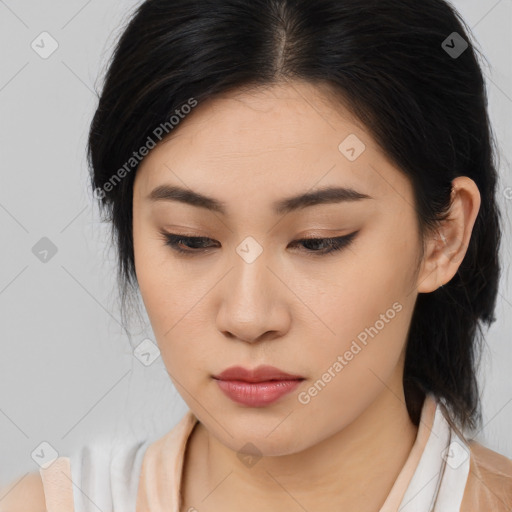 Joyful asian young-adult female with medium  brown hair and brown eyes