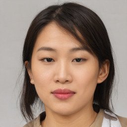 Neutral asian young-adult female with medium  brown hair and brown eyes