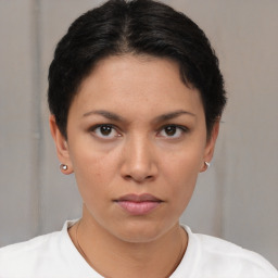 Neutral white young-adult female with short  brown hair and brown eyes