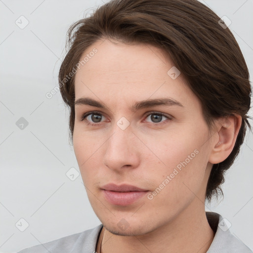 Neutral white young-adult female with medium  brown hair and grey eyes