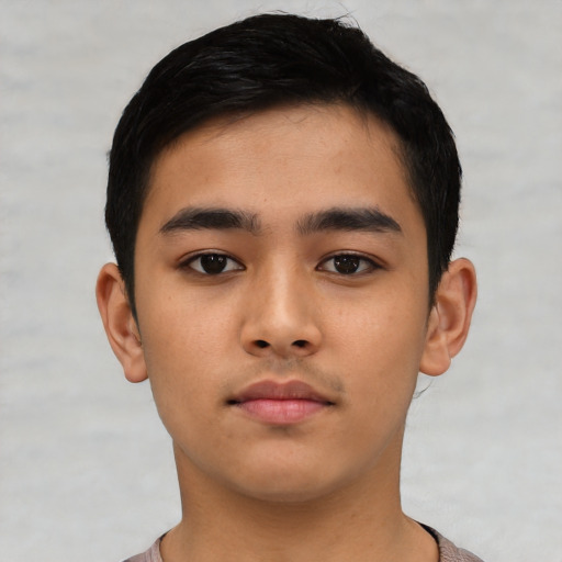 Neutral latino child male with short  black hair and brown eyes