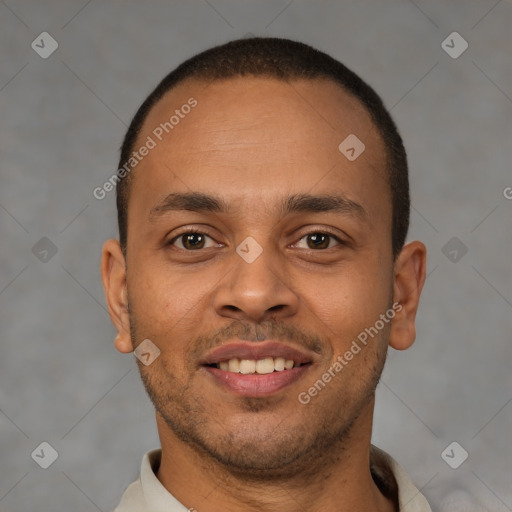 Joyful latino young-adult male with short  brown hair and brown eyes