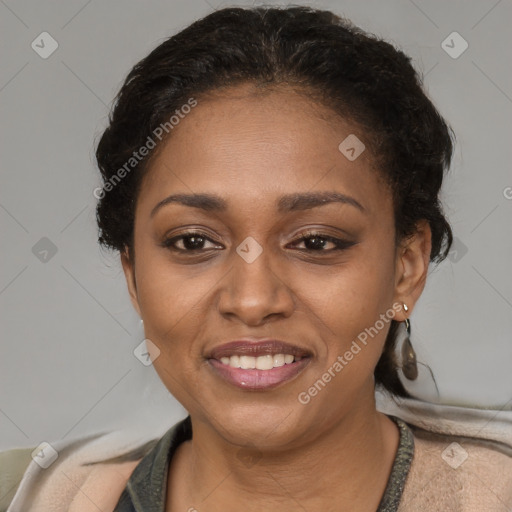 Joyful latino adult female with short  brown hair and brown eyes