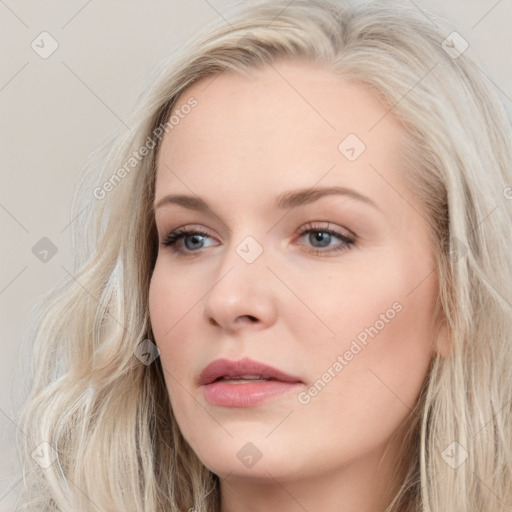 Neutral white young-adult female with long  brown hair and blue eyes