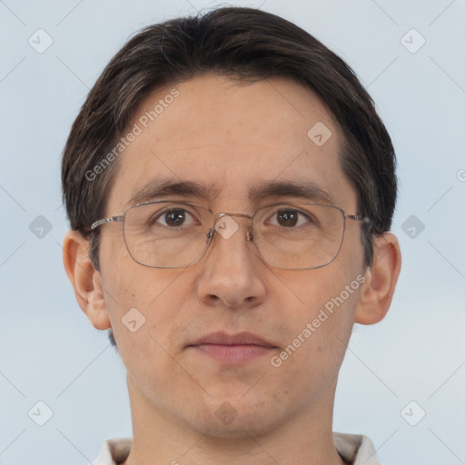 Joyful white adult male with short  brown hair and brown eyes