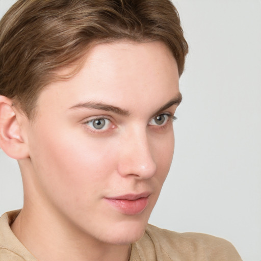 Neutral white young-adult female with short  brown hair and blue eyes