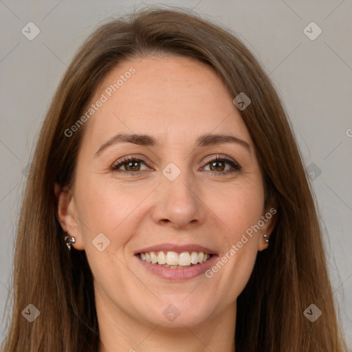 Joyful white young-adult female with long  brown hair and green eyes