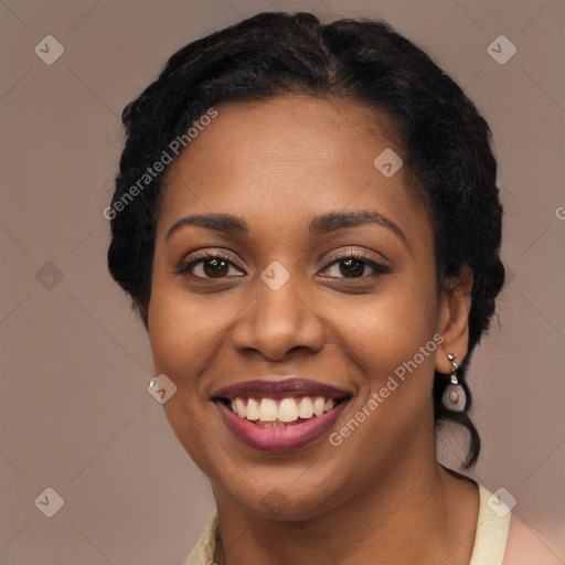 Joyful latino young-adult female with long  brown hair and brown eyes