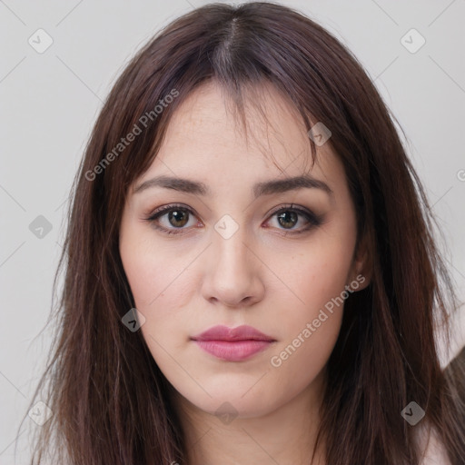 Neutral white young-adult female with long  brown hair and brown eyes