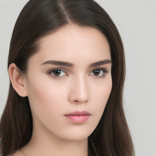 Neutral white young-adult female with long  brown hair and brown eyes
