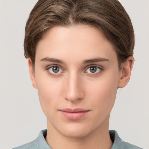 Neutral white young-adult female with short  brown hair and brown eyes