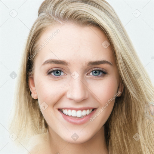 Joyful white young-adult female with long  brown hair and blue eyes