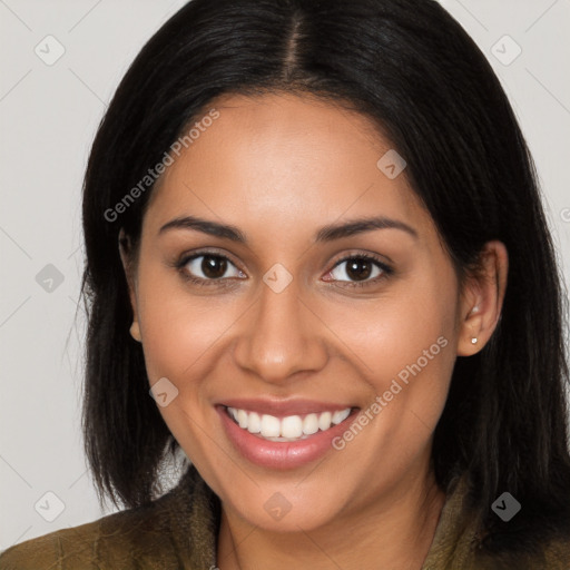 Joyful latino young-adult female with long  brown hair and brown eyes