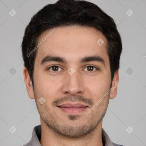 Joyful white young-adult male with short  black hair and brown eyes