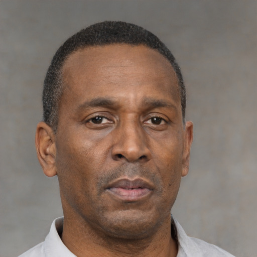 Neutral black adult male with short  brown hair and brown eyes