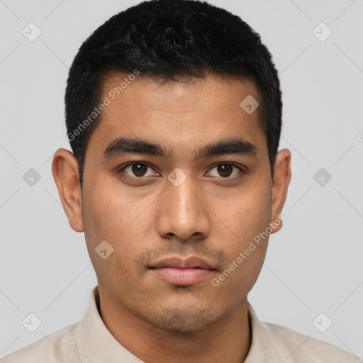 Neutral latino young-adult male with short  black hair and brown eyes