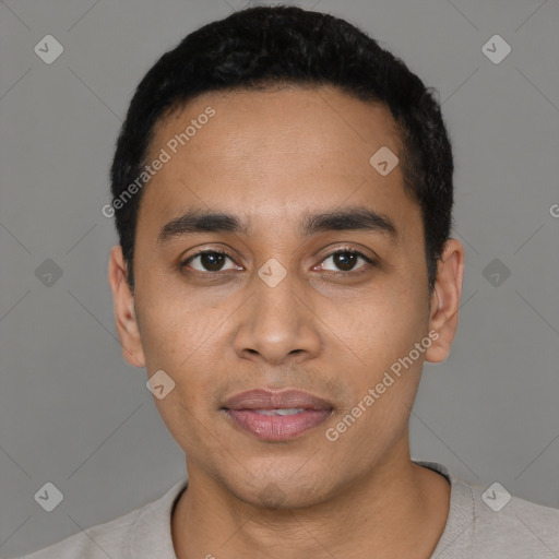 Joyful latino young-adult male with short  black hair and brown eyes