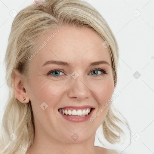 Joyful white young-adult female with long  blond hair and blue eyes