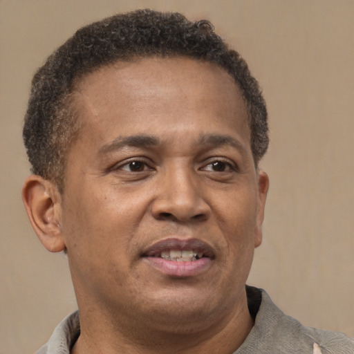 Neutral latino adult male with short  brown hair and brown eyes