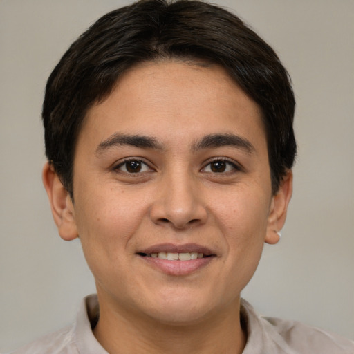 Joyful white young-adult female with short  brown hair and brown eyes