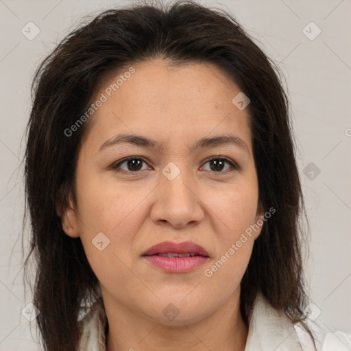 Joyful white adult female with medium  brown hair and brown eyes