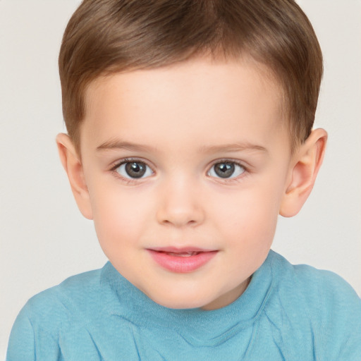 Joyful white child male with short  brown hair and brown eyes