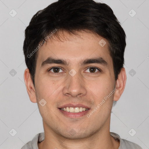 Joyful white young-adult male with short  brown hair and brown eyes