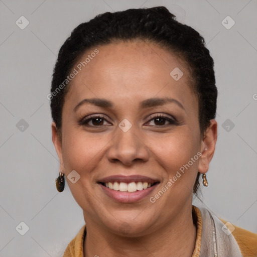 Joyful latino young-adult female with short  brown hair and brown eyes