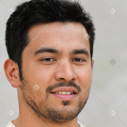 Joyful latino young-adult male with short  brown hair and brown eyes