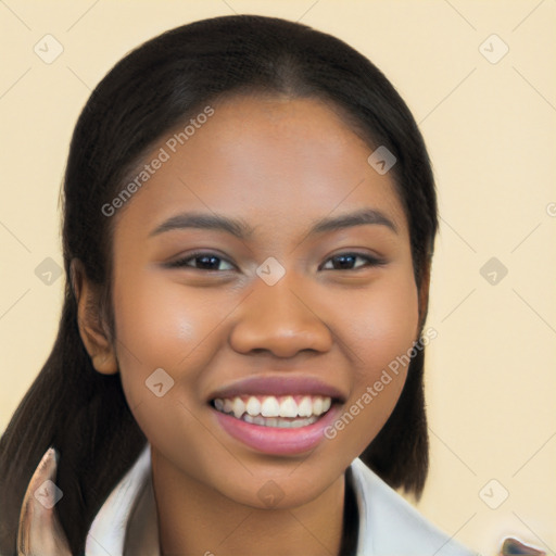 Joyful latino young-adult female with long  brown hair and brown eyes