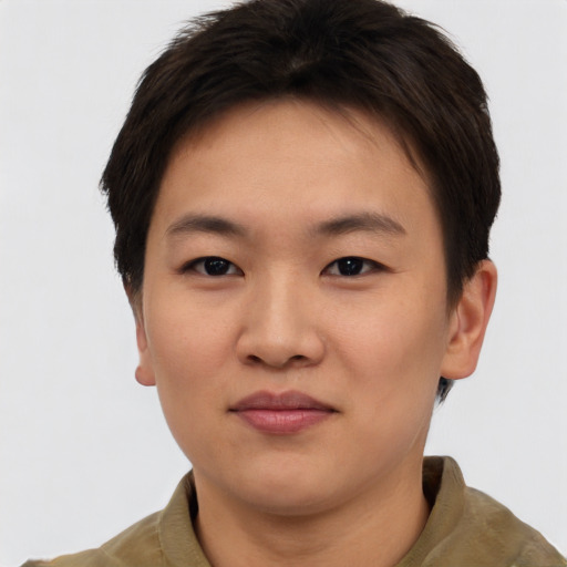 Joyful asian young-adult female with short  brown hair and brown eyes