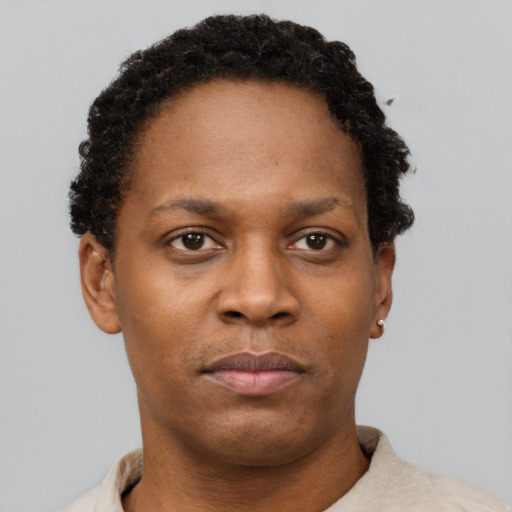 Neutral black young-adult female with short  brown hair and brown eyes