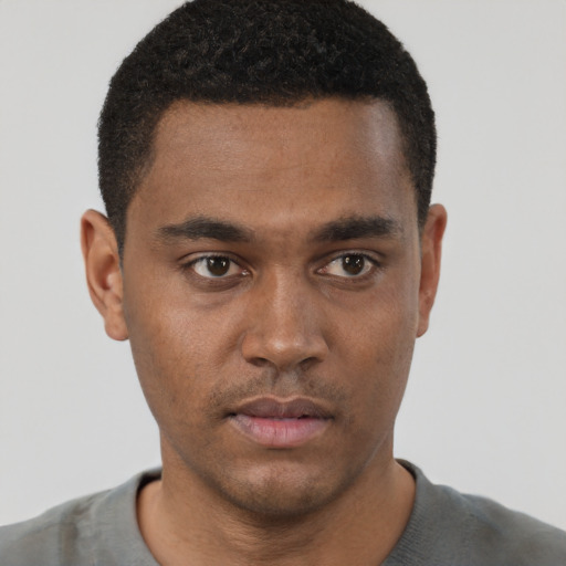 Neutral black young-adult male with short  brown hair and brown eyes