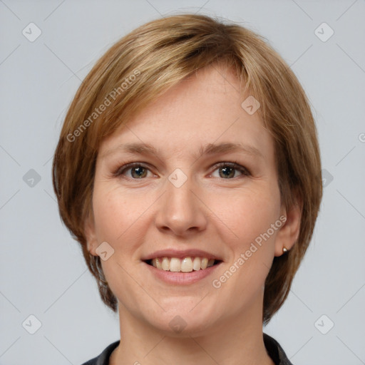 Joyful white young-adult female with medium  brown hair and grey eyes