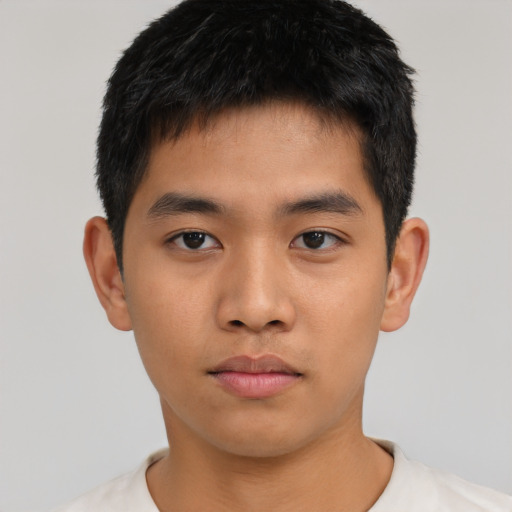Neutral asian young-adult male with short  black hair and brown eyes