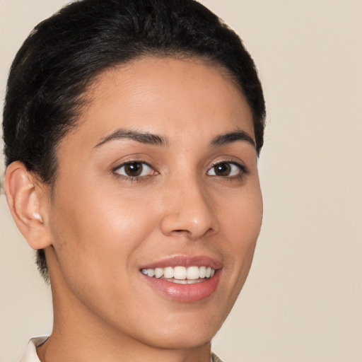 Joyful white young-adult female with short  brown hair and brown eyes