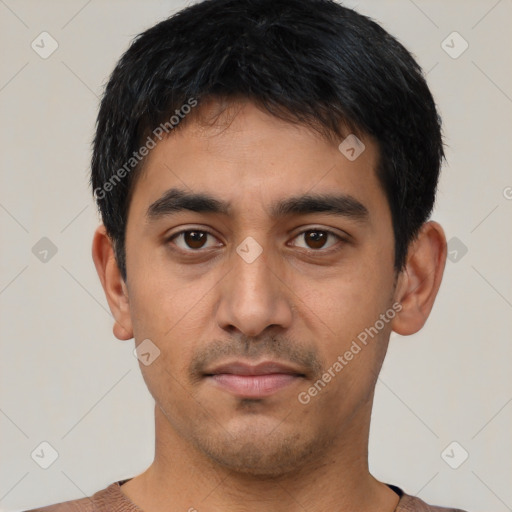 Neutral latino young-adult male with short  black hair and brown eyes