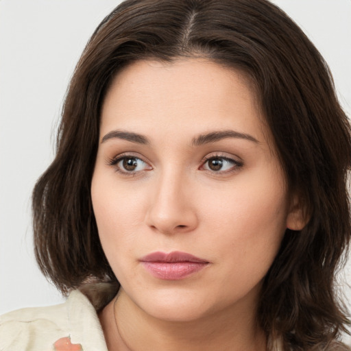 Neutral white young-adult female with medium  brown hair and brown eyes