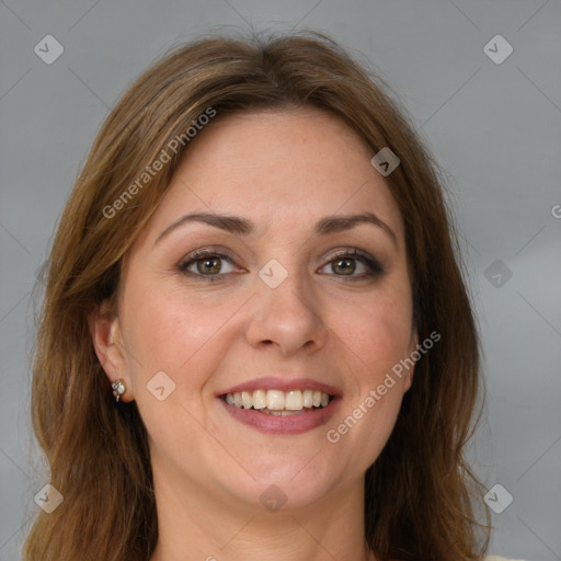 Joyful white young-adult female with long  brown hair and blue eyes