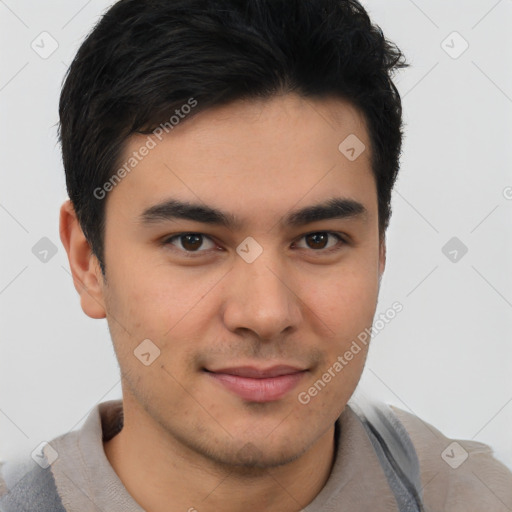 Joyful latino young-adult male with short  brown hair and brown eyes