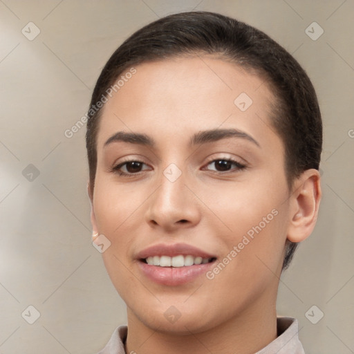 Joyful white young-adult female with short  brown hair and brown eyes